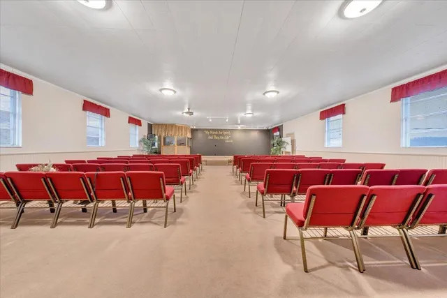a room with furniture and air hockey table