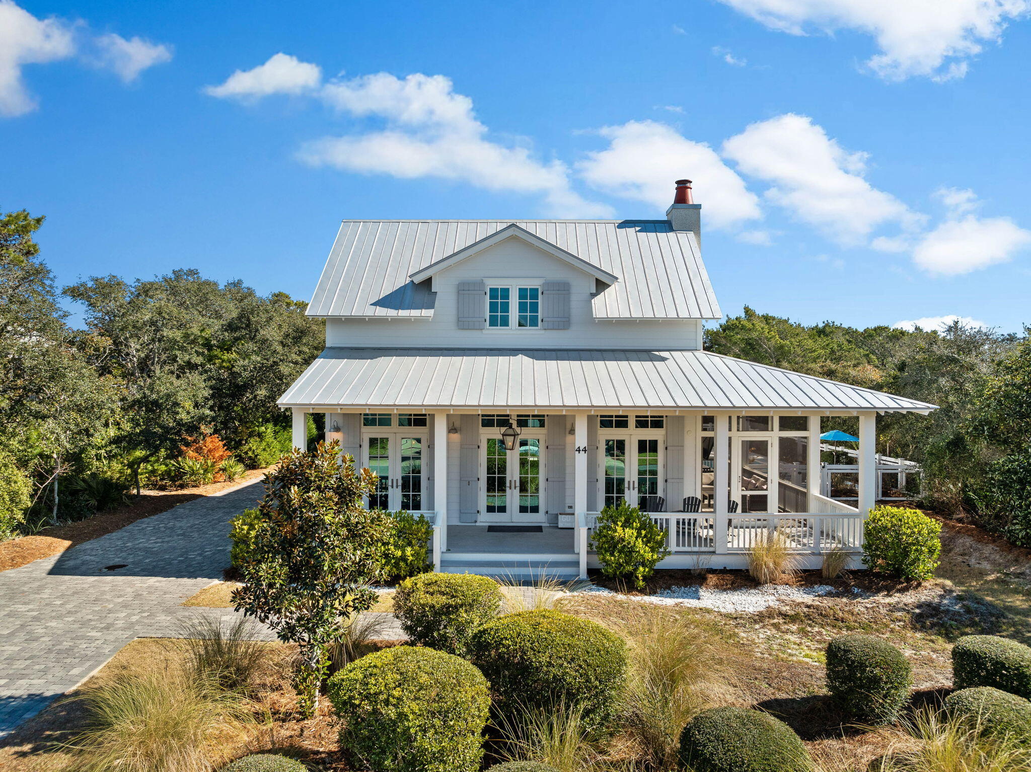 front view of a house with a patio