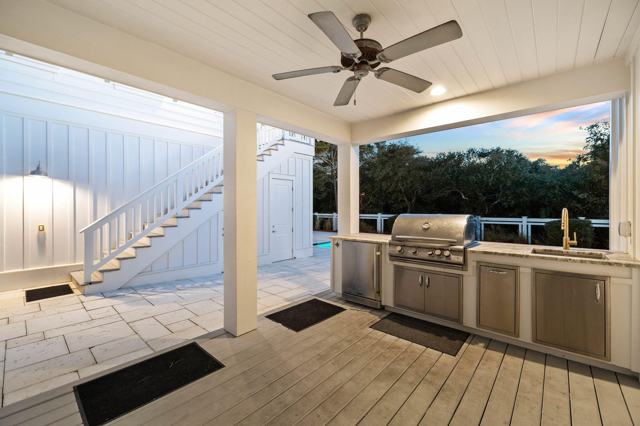 44 Seacrest Drive Inlet Beach, FL 32461 - Photo 110 of 129 a view of a kitchen with wooden floor and white cabinets