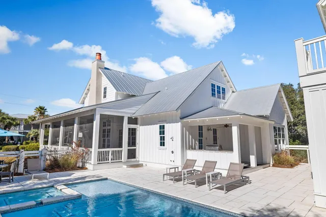a kitchen with stainless steel appliances a sink stove and cabinets