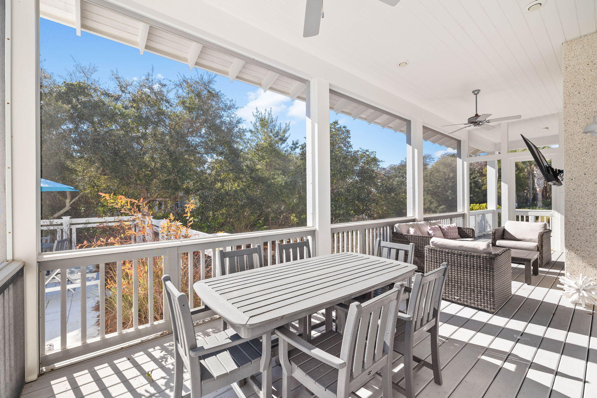 44 Seacrest Drive Inlet Beach, FL 32461 - Photo 22 of 129 a view of a dining room with furniture large windows and wooden floor