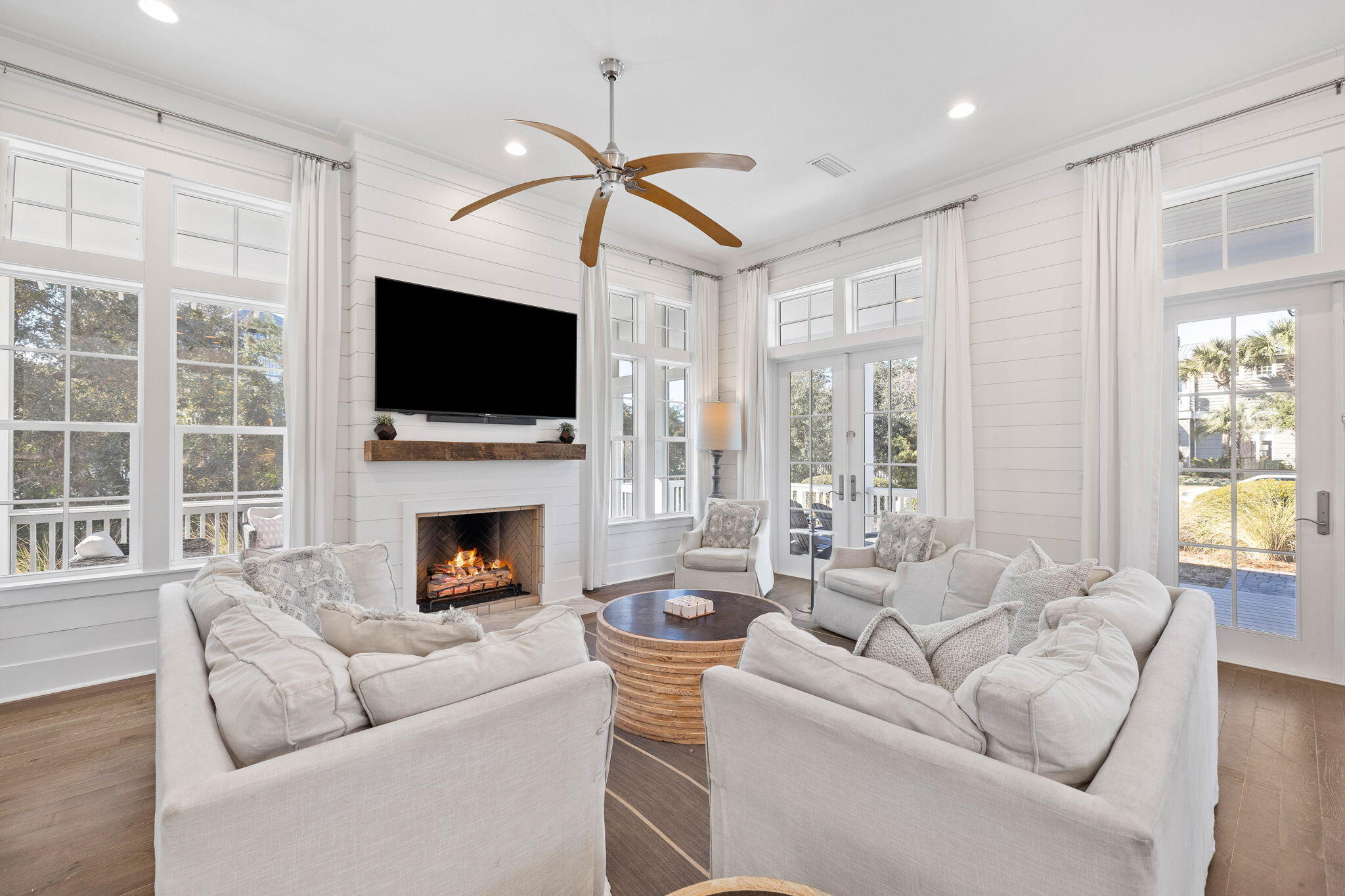 44 Seacrest Drive Inlet Beach, FL 32461 - Photo 26 of 129 a living room with furniture a fireplace and a flat screen tv