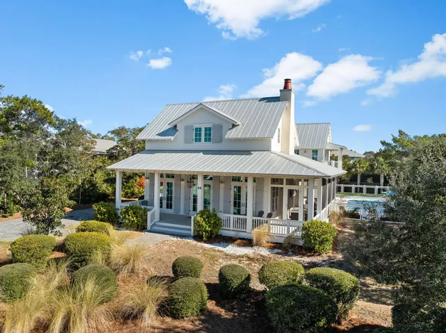 a front view of a house with a porch