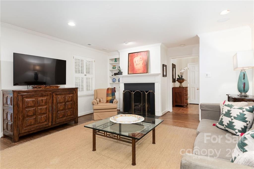 2815 Wickersham Road Charlotte, NC 28211 - Photo 11 of 34 a living room with furniture and a flat screen tv