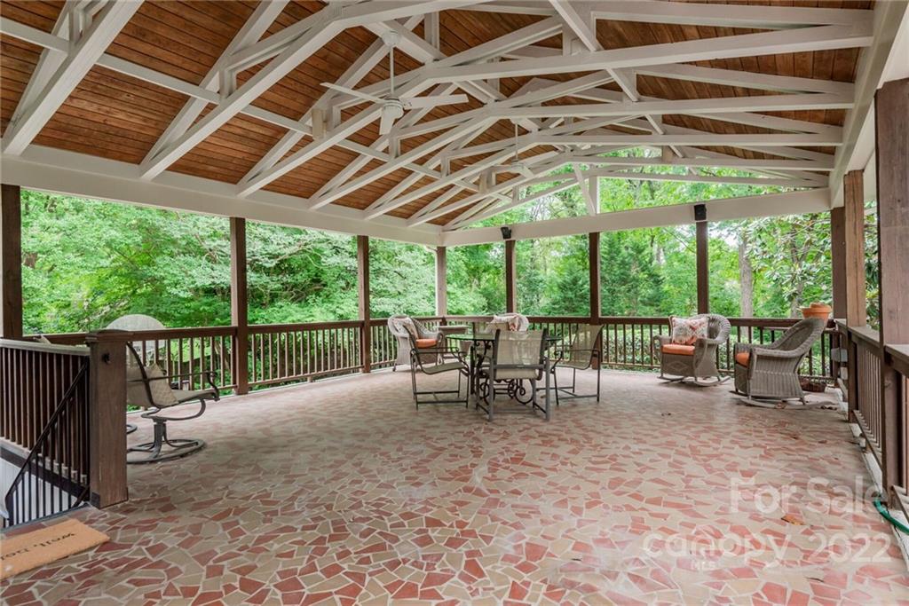 2815 Wickersham Road Charlotte, NC 28211 - Photo 14 of 34 a view of a chairs and table in the patio