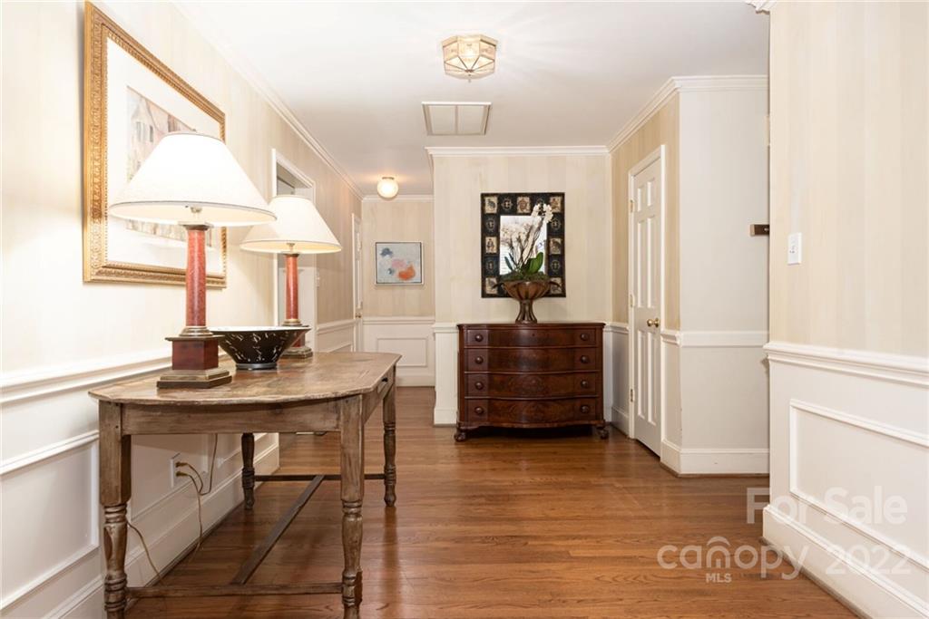 2815 Wickersham Road Charlotte, NC 28211 - Photo 3 of 34 a view of a workspace with furniture and a window