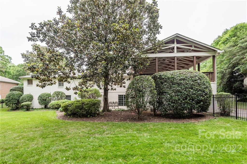2815 Wickersham Road Charlotte, NC 28211 - Photo 33 of 34 a front view of a house with garden