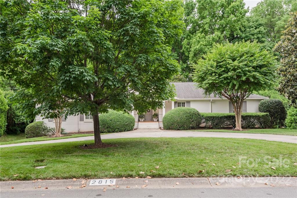 2815 Wickersham Road Charlotte, NC 28211 - Photo 34 of 34 a view of a house with a yard and tree s