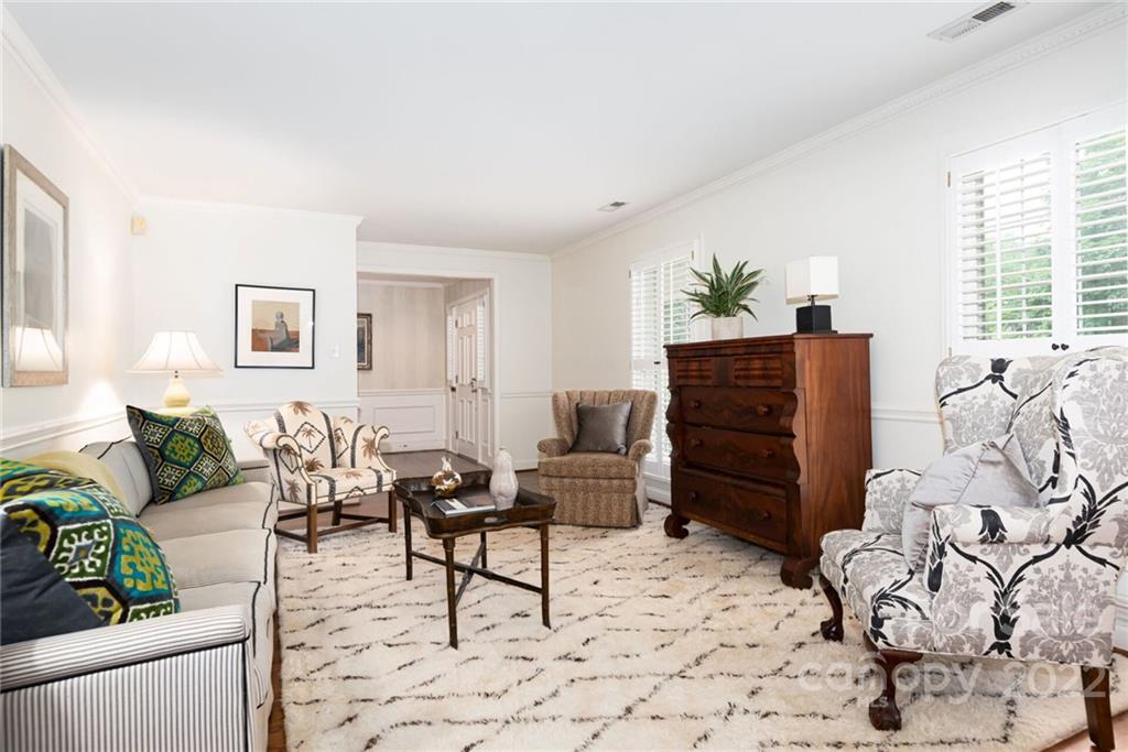 2815 Wickersham Road Charlotte, NC 28211 - Photo 5 of 34 a living room with furniture and wooden floor