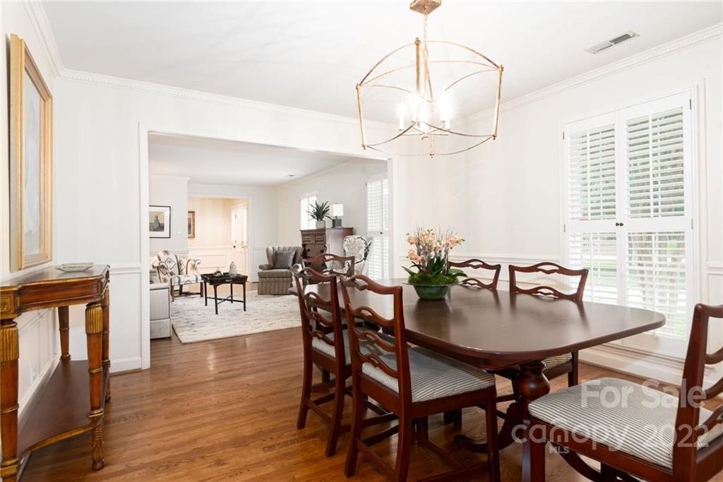 2815 Wickersham Road Charlotte, NC 28211 - Photo 7 of 34 a view of a dining room with furniture window and wooden floor