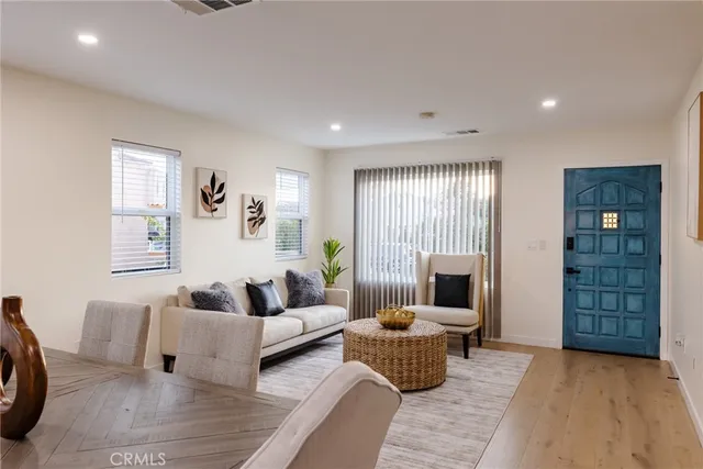 a kitchen with refrigerator and window