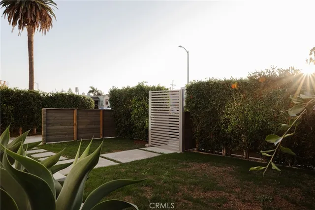 a kitchen with a sink appliances and cabinets