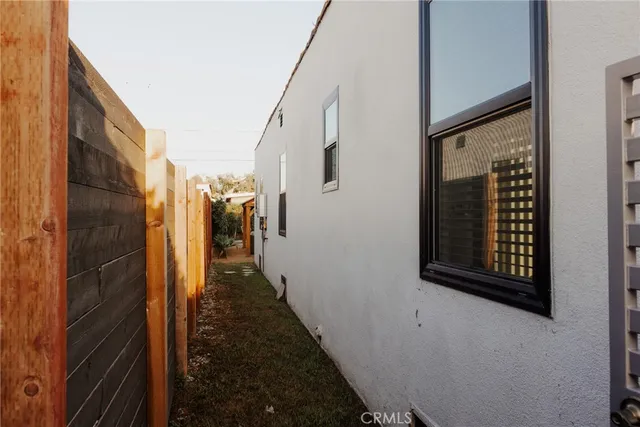 a kitchen with a sink and refrigerator