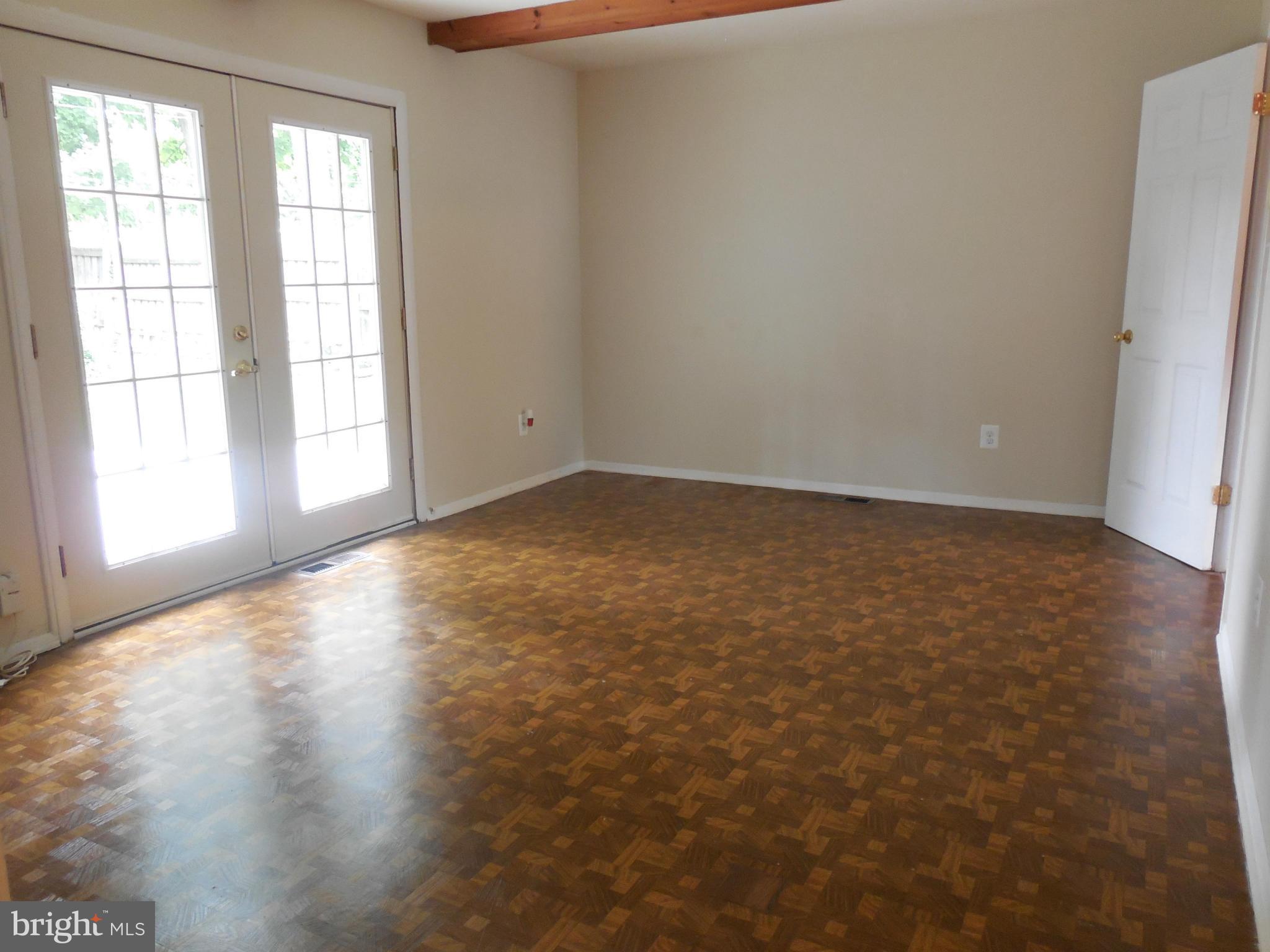 418 Highmeadow Road Reisterstown, MD 21136 - Photo 11 of 30 1st Flr Family Rm with Atrium Dr to Deck
