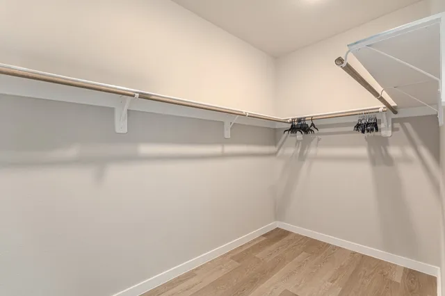 a view of a room with racks on the wall