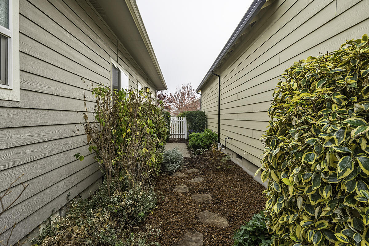 1078 North Haskell Street Central Point, OR 97502 - Photo 21 of 25 a view of a house with a backyard