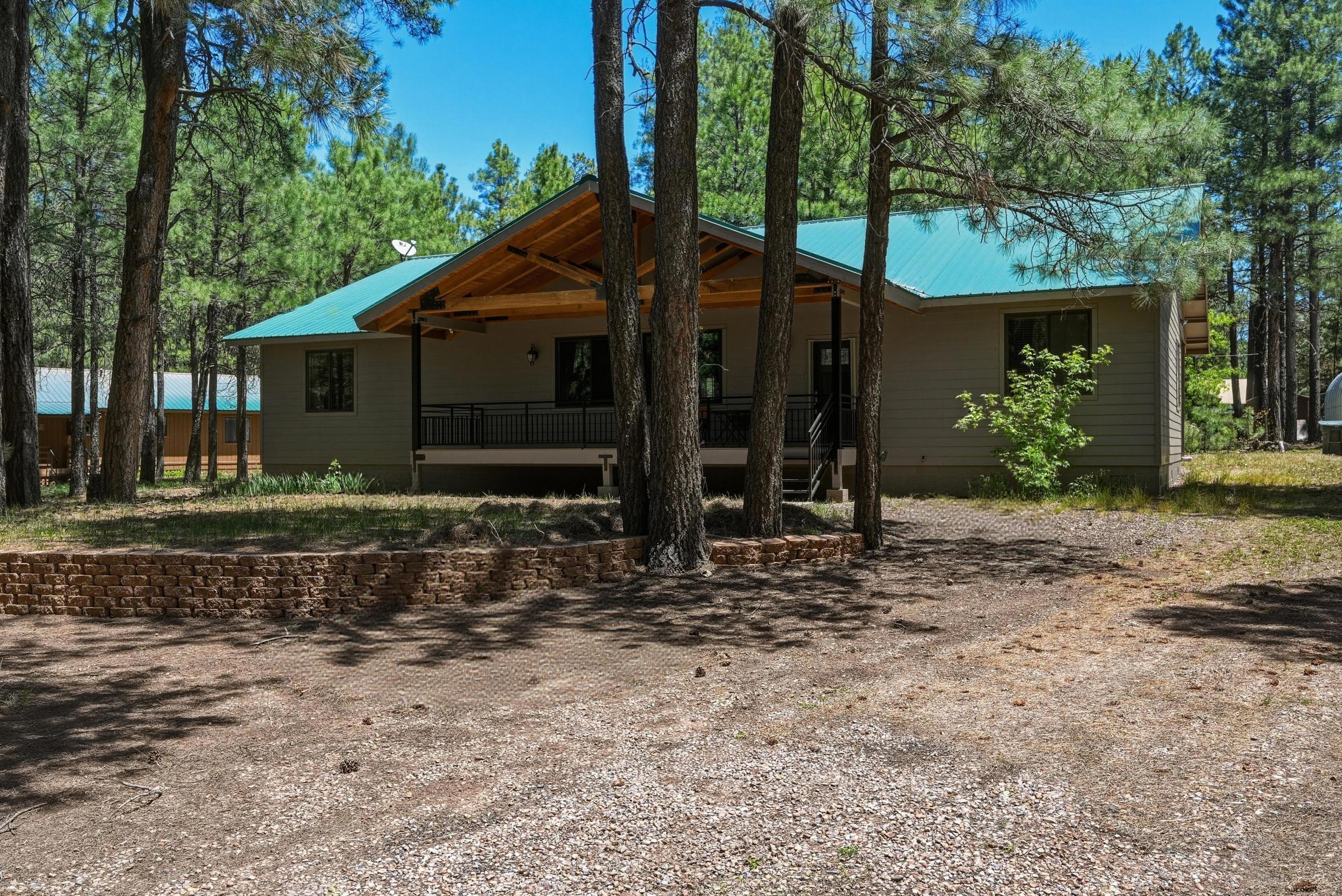 1233 Merzville Road Forest Lakes, AZ 85931 - Photo 2 of 39 a view of a house with a yard