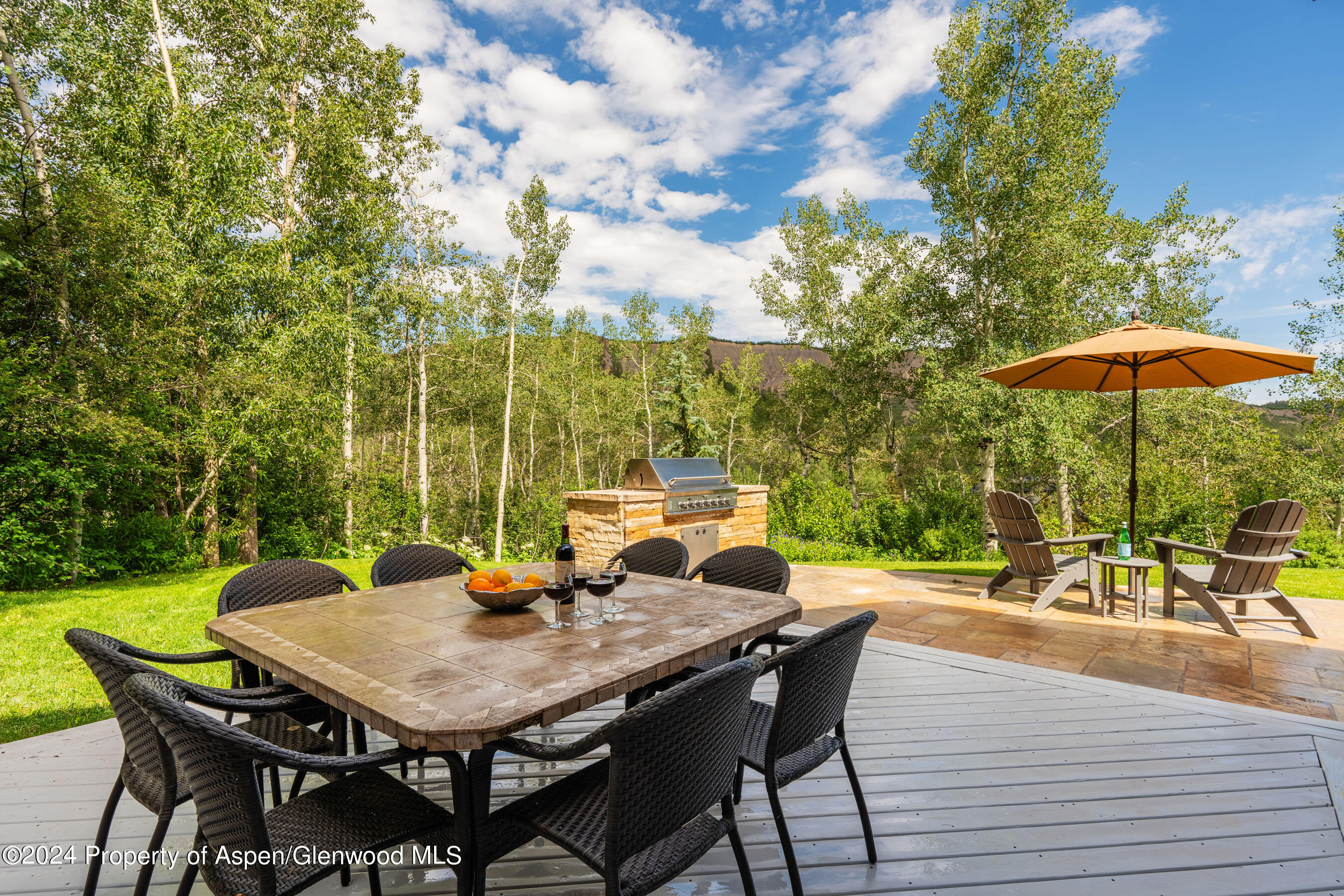 439 Maple Ridge Lane Snowmass Village, CO 81615 - Photo 31 of 42 Patio Dining Area with Built-In Grill