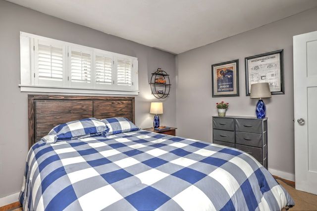 a view of a room with wooden walls