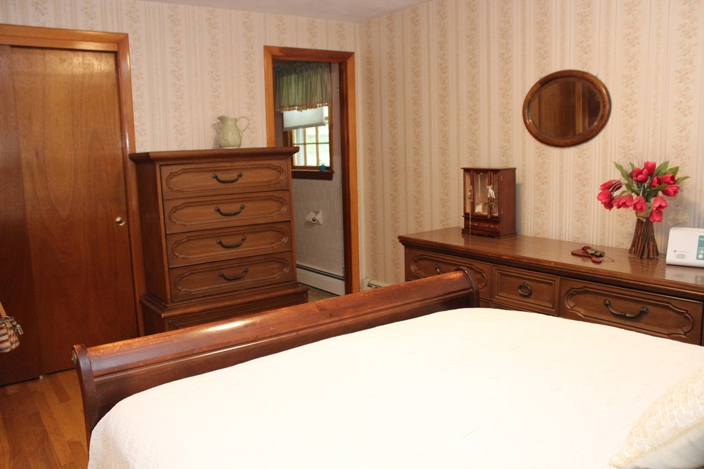 2 Ridge Road Hudson, MA 01749 - Photo 15 of 25 a bathroom with a sink and a mirror