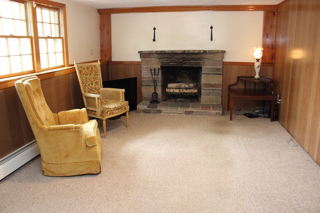 2 Ridge Road Hudson, MA 01749 - Photo 19 of 25 a living room with furniture and a fireplace