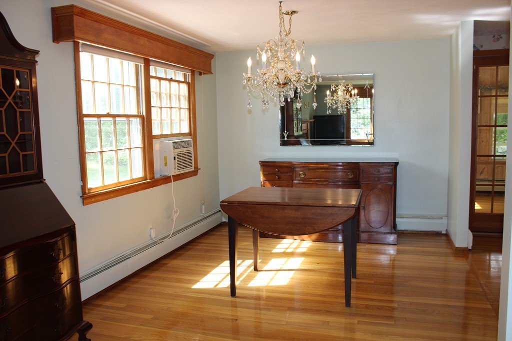 2 Ridge Road Hudson, MA 01749 - Photo 6 of 25 a view of a room with furniture wooden floor and chandelier