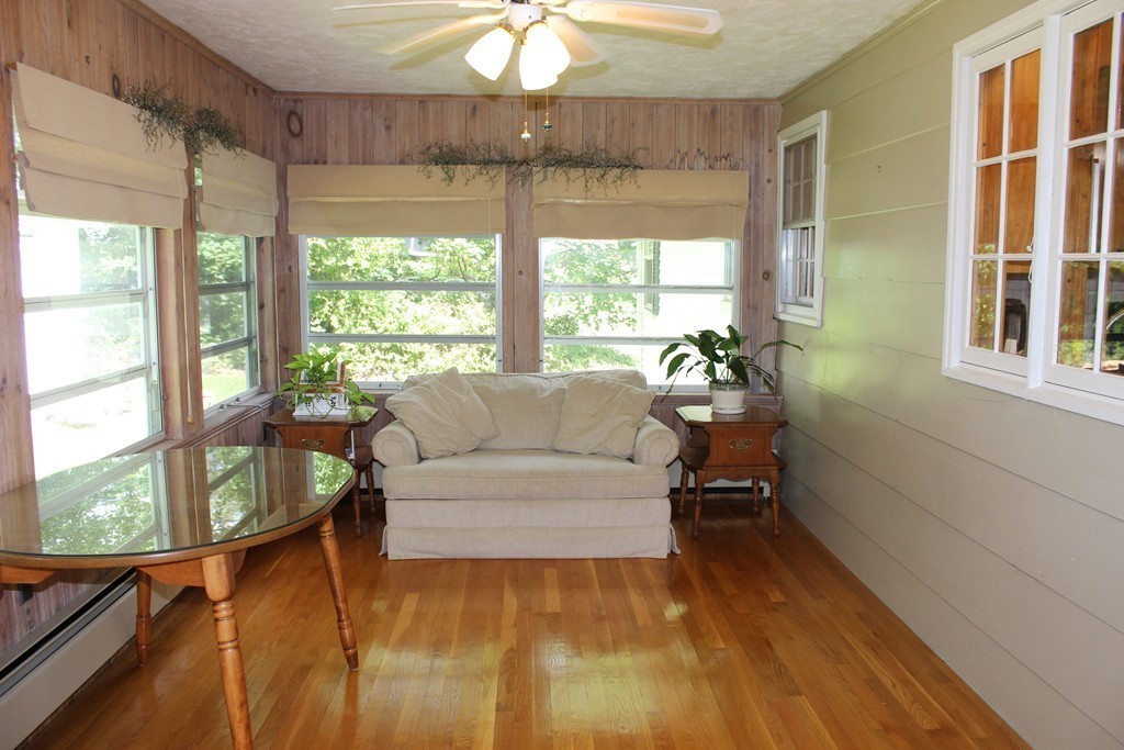 2 Ridge Road Hudson, MA 01749 - Photo 9 of 25 a living room with furniture and a large window
