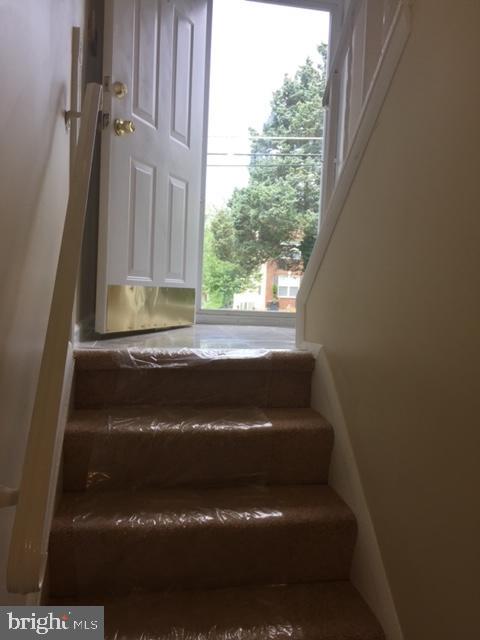 8602 Fort Foote Road Fort Washington, MD 20744 - Photo 14 of 22 Staircase from Lower Level to Foyer