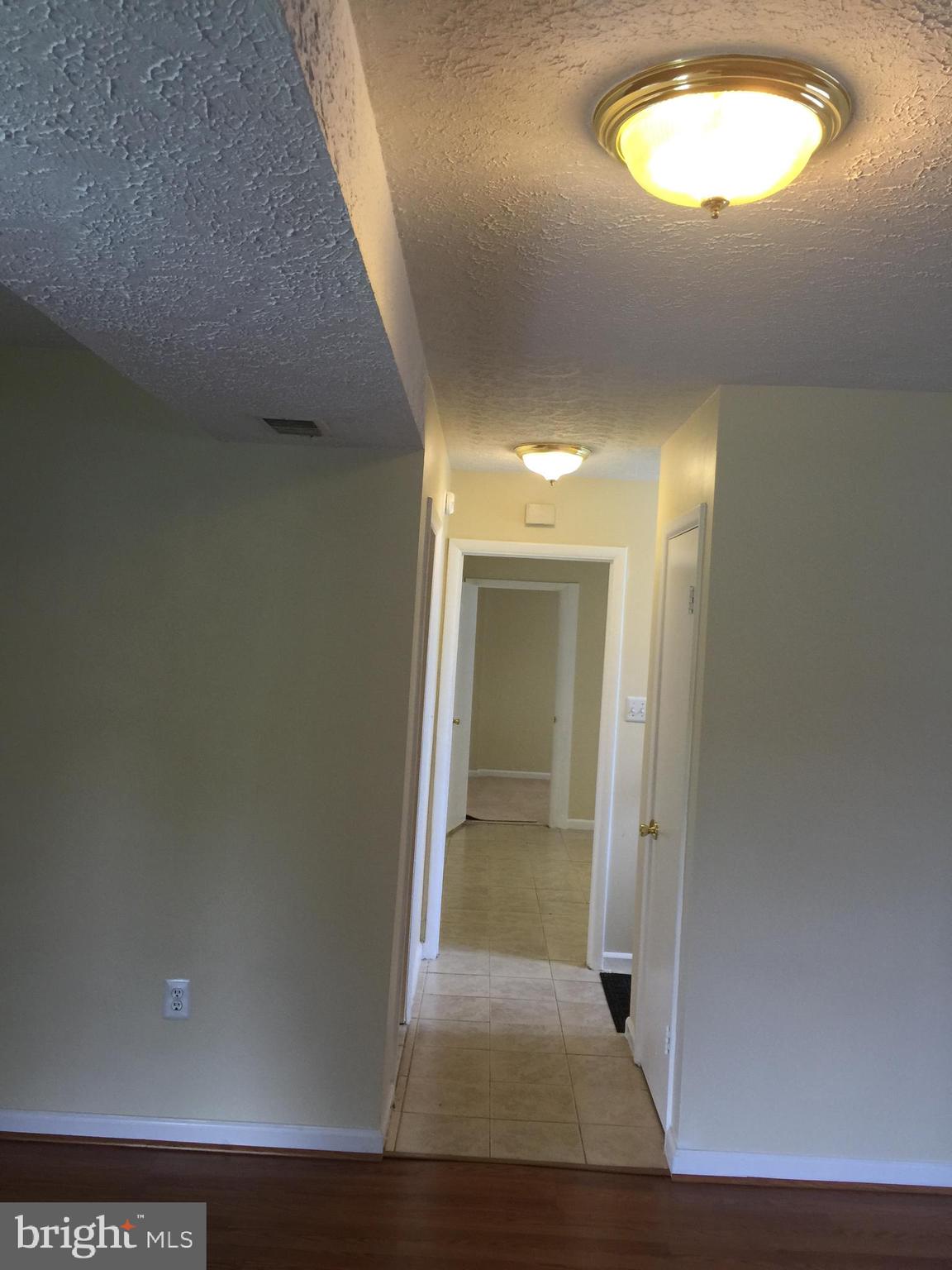 8602 Fort Foote Road Fort Washington, MD 20744 - Photo 16 of 22 Lower Level Hallway