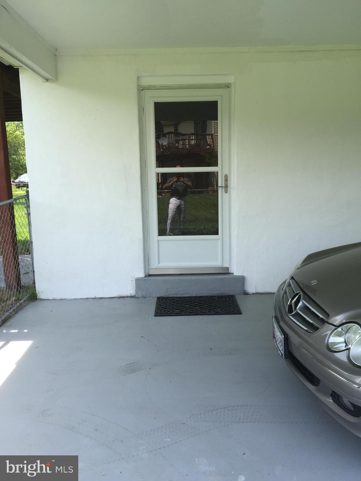 8602 Fort Foote Road Fort Washington, MD 20744 - Photo 19 of 22 Side entrance from Carport to Family Room