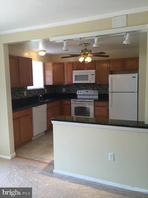 8602 Fort Foote Road Fort Washington, MD 20744 - Photo 3 of 22 Open Kitchen with server counter