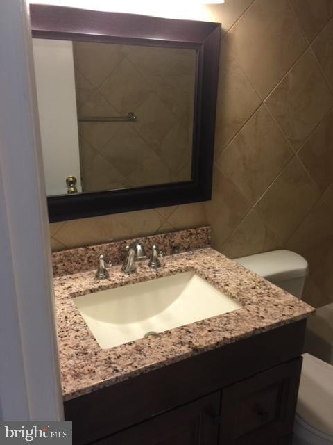 8602 Fort Foote Road Fort Washington, MD 20744 - Photo 5 of 22 Hallway Bathroom Vanity