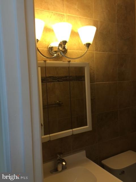 8602 Fort Foote Road Fort Washington, MD 20744 - Photo 10 of 22 Master Bedroom Bathroom Vanity
