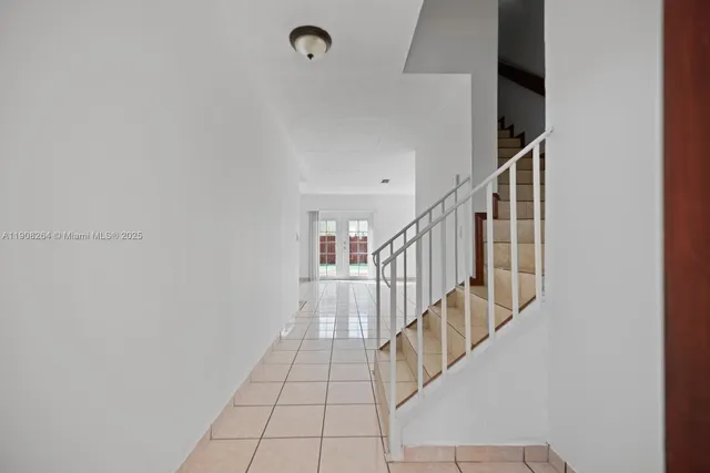 a view of entryway with stairs