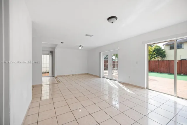 a view of an empty room and window