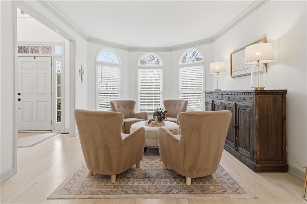 207 Cedarhurst Drive Canton, GA 30115 - Photo 11 of 83 a living room with couches and large glass door with wooden floor