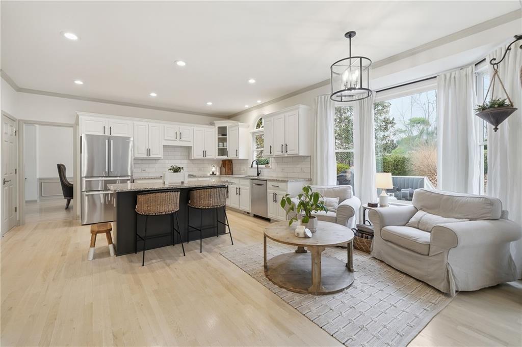 207 Cedarhurst Drive Canton, GA 30115 - Photo 14 of 83 a living room with furniture and a large window
