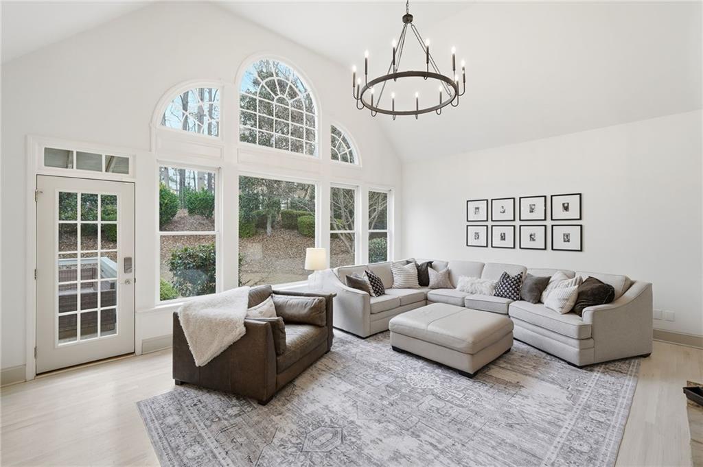 207 Cedarhurst Drive Canton, GA 30115 - Photo 23 of 83 a living room with furniture ceiling fan and a window
