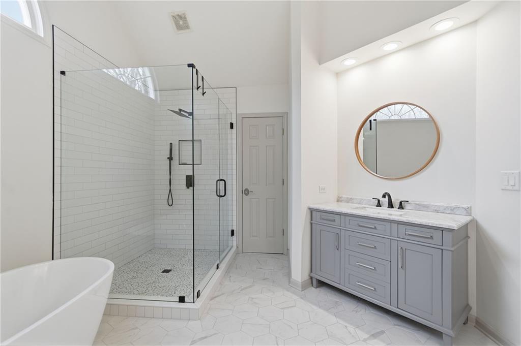207 Cedarhurst Drive Canton, GA 30115 - Photo 32 of 83 a bathroom with a sink a toilet and shower