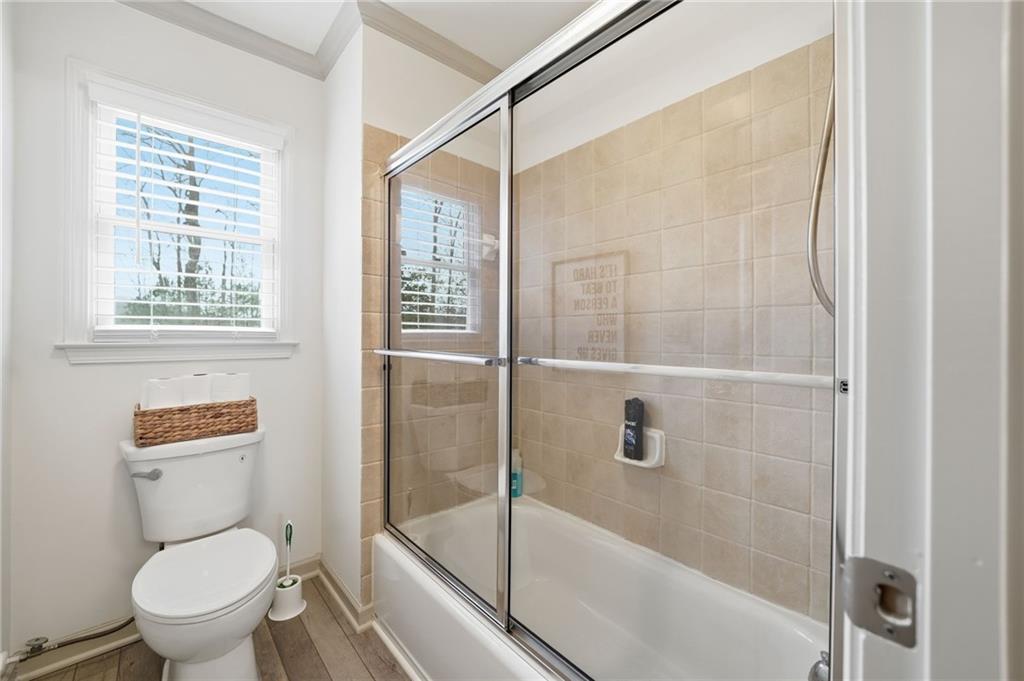 207 Cedarhurst Drive Canton, GA 30115 - Photo 39 of 83 a bathroom with a toilet and shower