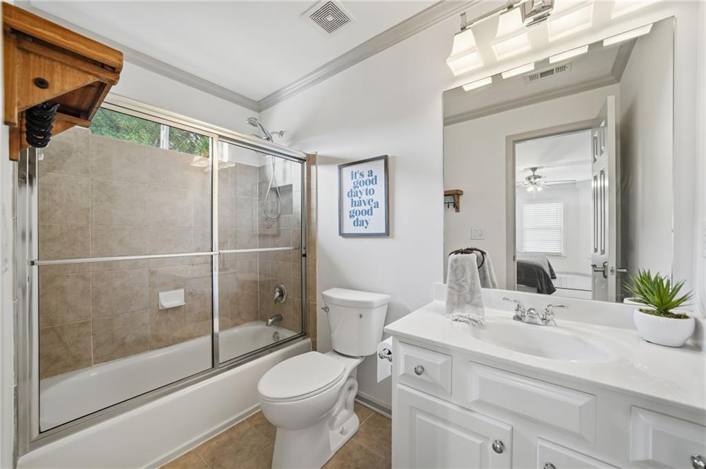 207 Cedarhurst Drive Canton, GA 30115 - Photo 44 of 83 a bathroom with a sink a toilet and shower