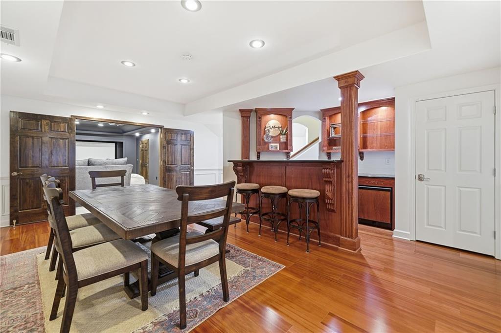 207 Cedarhurst Drive Canton, GA 30115 - Photo 46 of 83 a view of a dining room with furniture window and wooden floor