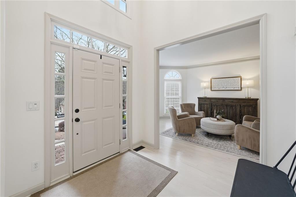 207 Cedarhurst Drive Canton, GA 30115 - Photo 5 of 83 a living room with furniture and white walls