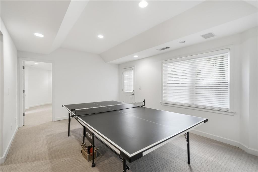 207 Cedarhurst Drive Canton, GA 30115 - Photo 53 of 83 a room with pool table windows and fan