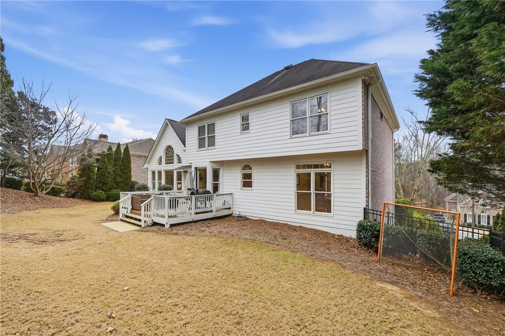 207 Cedarhurst Drive Canton, GA 30115 - Photo 65 of 83 a view of a house with table and chairs in patio