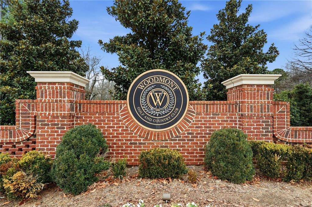 207 Cedarhurst Drive Canton, GA 30115 - Photo 75 of 83 a front view of a house with garden