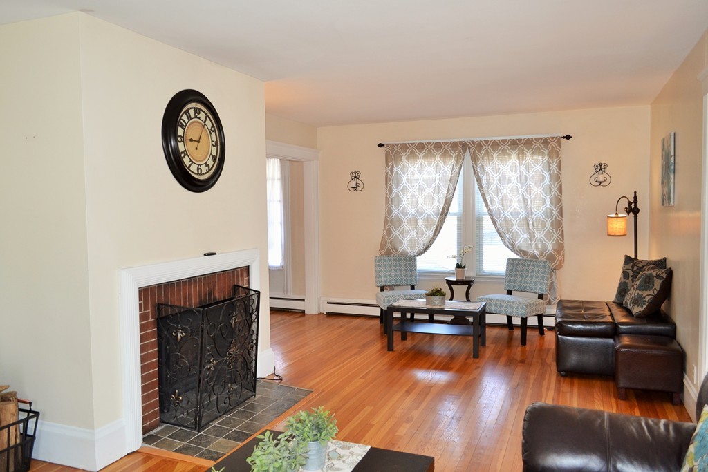 29 Station Road Salem, MA 01970 - Photo 4 of 24 a room with furniture and a large window