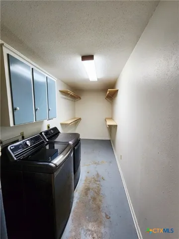 a kitchen with a stove and a sink