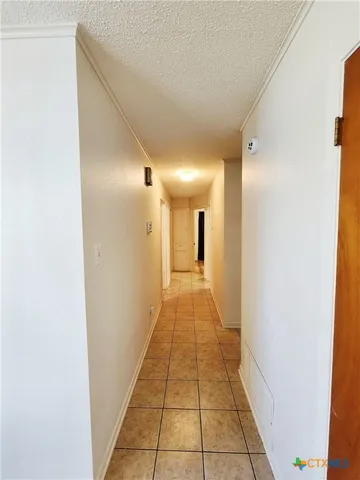 a hallway with a wooden floor