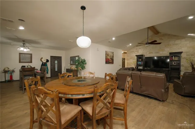 a view of a dining room with furniture